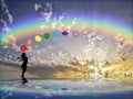 Spiritual background with chakras, human silhouette and rainbow in sea reflection Royalty Free Stock Photo