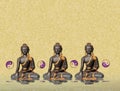 Spiritual background for meditation with buddha statue and yin yang symbol isolated in golden background Royalty Free Stock Photo