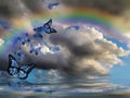 Spiritual background for meditation with butterflies, stormy clouds and rainbow in sea reflection Royalty Free Stock Photo