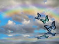 Spiritual background for meditation with butterflies, stormy clouds and rainbow in sea reflection Royalty Free Stock Photo