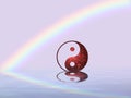 Spiritual background for meditation with yin yang symbol and rainbow in sea reflection Royalty Free Stock Photo