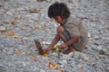 Spiritual Child Worships/Offer Puja, Ganges River, Rishikesh, India