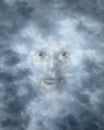 Spiritual faces peering through clouds