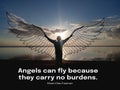 Spiritual inspirational motivational quote - Angels can fly because they carry no burdens. With angel silhouette with wings. Royalty Free Stock Photo
