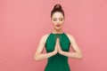 Spiritual practice. Woman closed eyes, doing meditation, mudram