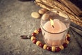 Spiritual still life with candles, beads and dry flowers