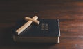 Spirituality, Religion and Hope Concept. Holy Bible and Cross on Desk. Symbol of Humility, Supplication,Believe and Faith for Royalty Free Stock Photo