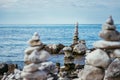 Spirituality and wellness: Cairns on a pebble beach