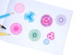 Spirograph ruler on white background. Drawing the spirograph pattern on paper.