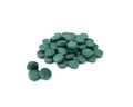 Spirulina in tablets. Royalty Free Stock Photo