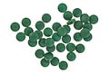 Spirulina tablets isolated on white background Royalty Free Stock Photo