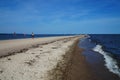 Spit with vacationers on the coast of the Baltic Gulf in the village of Rewa, Poland Royalty Free Stock Photo