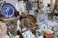 Spitalfields Antic Market. Display. Vintage teddy bear among antique items