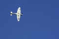 Spitfire against deep blue sky Royalty Free Stock Photo