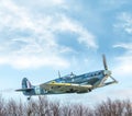 Spitfire fighter plane with room for text