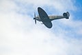 Spitfire flying into cloud.