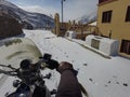 Spiti, Himachal Pradesh, India - April 7th, 2021 : Winter landscape in a fabulous location, Bike riding in snow covered village in