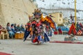 Spiti, Himachal Pradesh, India - March 24, 2019 : Tibetan buddhist lamas dressed in mystical mask dance Tsam mystery in time of