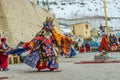 Spiti, Himachal Pradesh, India - March 24, 2019 : Tibetan buddhist lamas dressed in mystical mask dance Tsam mystery in time of