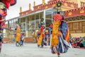 Spiti, Himachal Pradesh, India - March 24, 2019 : Tibetan buddhist lamas dressed in mystical mask dance Tsam mystery in time of