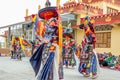 Spiti, Himachal Pradesh, India - March 24, 2019 : Tibetan buddhist lamas dressed in mystical mask dance Tsam mystery in time of