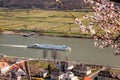 Spitz village with ship on Danube river in Wachau valley during spring time, Austria Royalty Free Stock Photo