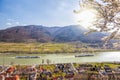 Spitz village with ships on Danube river in Wachau valley during spring time, Austria