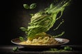 Splash abd levitation of delicious green pasta dish with pesto sauce and fresh herbs