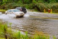 Splash by car as it goes through flood water after heavy rains of Harvey hurricane storm Royalty Free Stock Photo