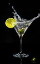 Splash of a cocktail in martini glass Royalty Free Stock Photo