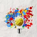 Splash colors lightbulb crumpled paper Royalty Free Stock Photo