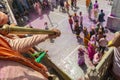 Splash of colours using Waterguns during Samaj at nandgaon Temple for Samaj During Holi Festival,UttarPradesh,India Royalty Free Stock Photo