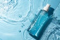 Splash Cosmetic Moisturizer Water Micellar Toner or Emulsion Blue Colored Abstract Background Royalty Free Stock Photo