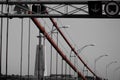 Splash of the 25 de Abril bridge and the Christ the King of Lisbon