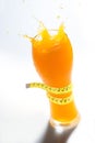 Splash on a diet orange juice Royalty Free Stock Photo