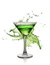 Splash in glass of bright green alcoholic cocktail drink Royalty Free Stock Photo