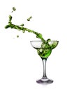 Splash in glass of a green alcoholic cocktail drink Royalty Free Stock Photo