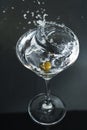 Splash in glass of martini