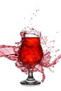 Splash in glass of red alcoholic cocktail drink Royalty Free Stock Photo