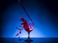 Splash glass red wine Royalty Free Stock Photo