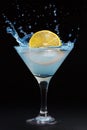 A splash from a lemon in a martini glass Royalty Free Stock Photo