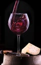 Splash red wine against a black background Royalty Free Stock Photo