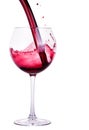 Splash red wine against a white background Royalty Free Stock Photo