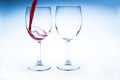 Splash red wine glass against a white background Royalty Free Stock Photo