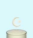 Splash ripple of liquid white milk yogurt cream in form of crescent moon and star in a glass.