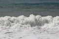 Splash of sea water after hitting a rocky cliff in southwestern Cyprus near the town of Paphos. Stormy and dangerous situation.