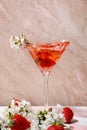 Splash of strawberry cocktail in martini glass Royalty Free Stock Photo
