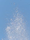 Splash of water on blue sky backgournd