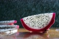 a splash of water drips into the pitaya Royalty Free Stock Photo