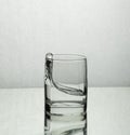 Splash of water in a whisky glass Royalty Free Stock Photo